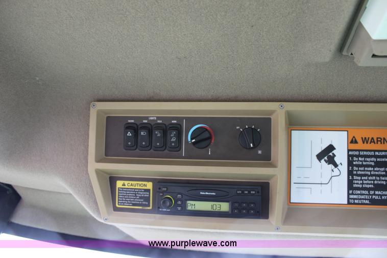 image for item B8652 2004 John Deere 4895 swather