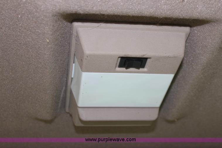 image for item B8652 2004 John Deere 4895 swather