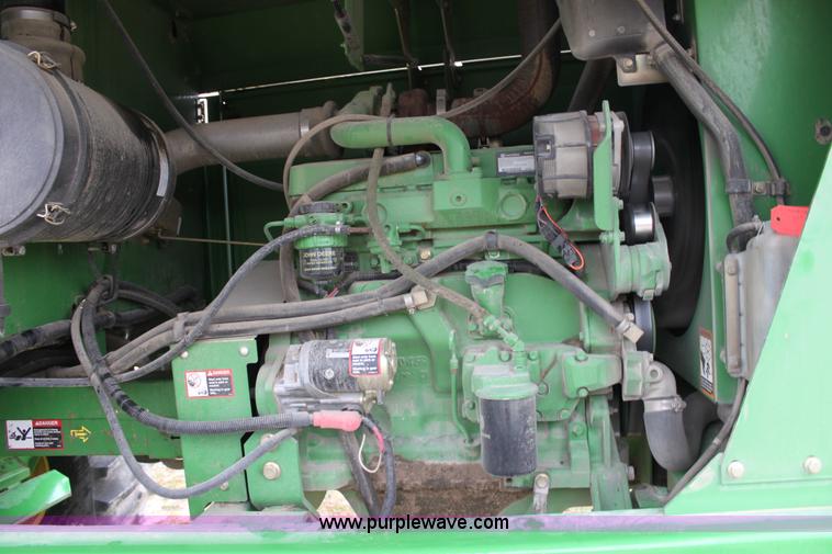 image for item B8652 2004 John Deere 4895 swather