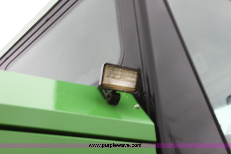 image for item B8652 2004 John Deere 4895 swather