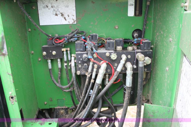 image for item B8652 2004 John Deere 4895 swather