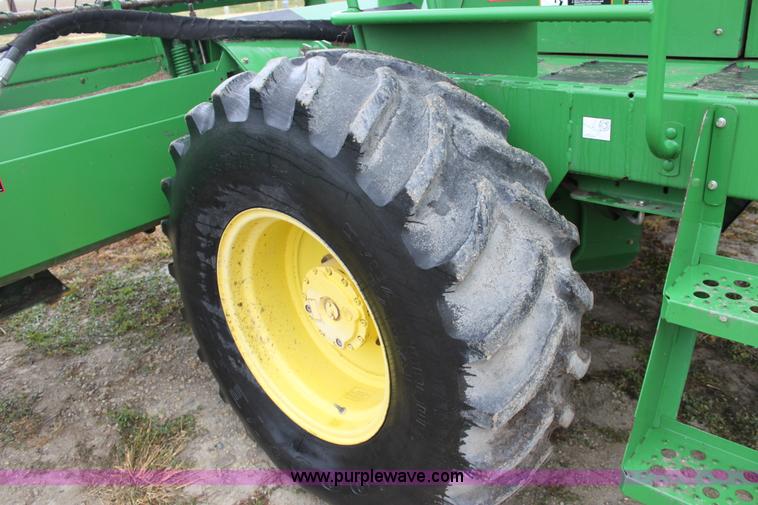 image for item B8652 2004 John Deere 4895 swather