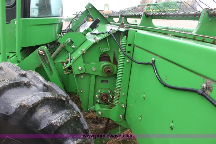 image for item B8652 2004 John Deere 4895 swather
