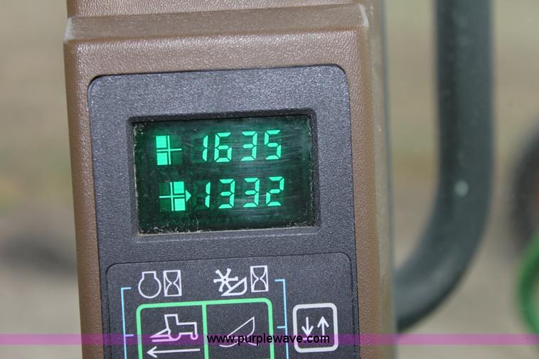 image for item B8652 2004 John Deere 4895 swather