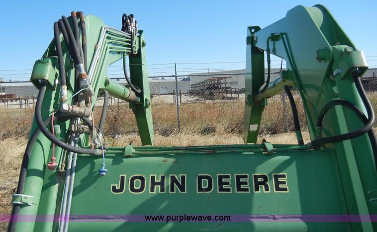 image for item H9048 John Deere 740 tractor loader