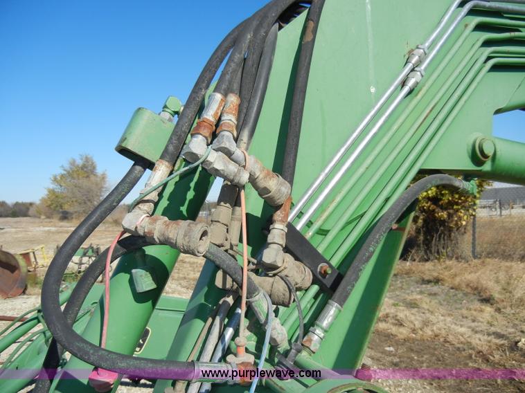 image for item H9048 John Deere 740 tractor loader