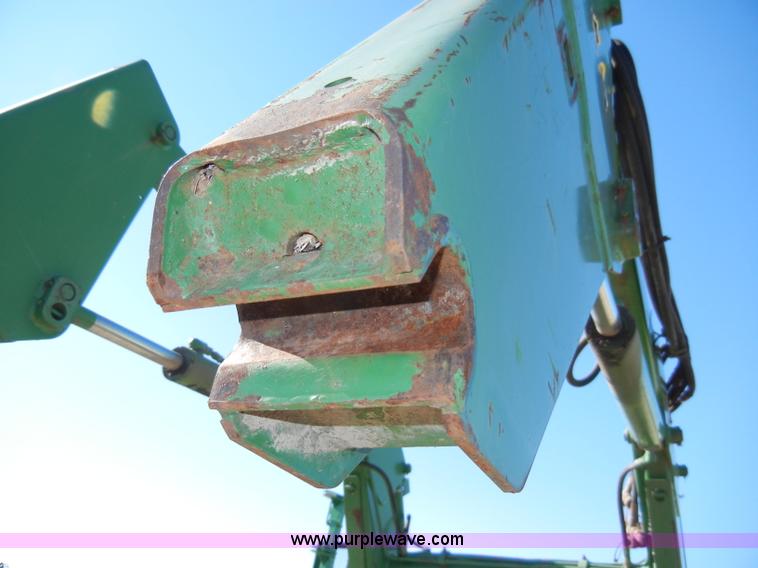 image for item H9048 John Deere 740 tractor loader