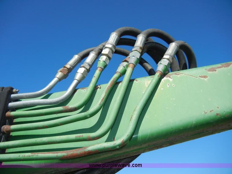 image for item H9048 John Deere 740 tractor loader