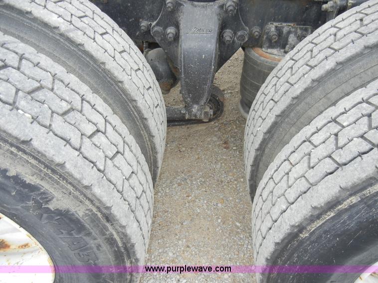 image for item A3324 2000 Freightliner FLC112 semi truck