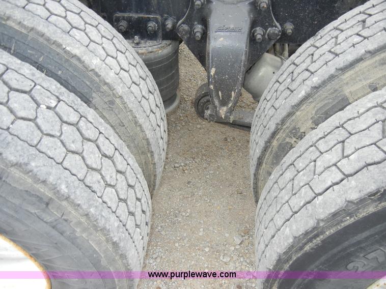 image for item A3324 2000 Freightliner FLC112 semi truck