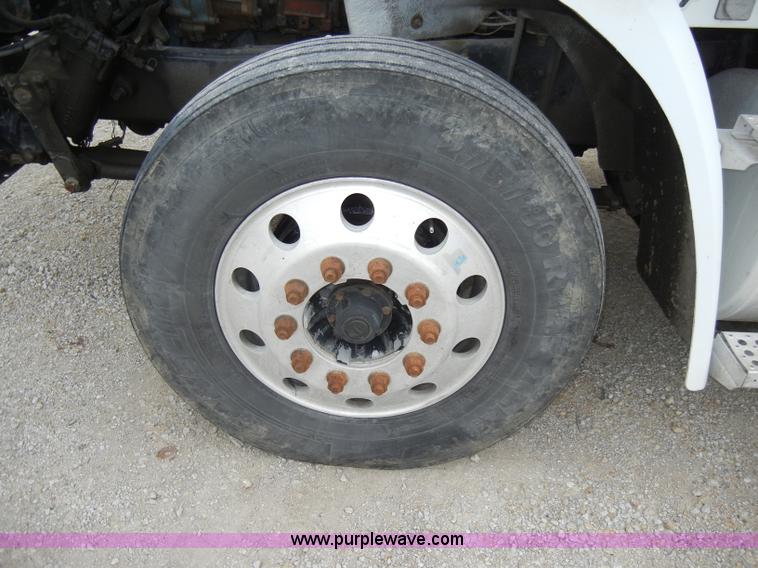 image for item A3324 2000 Freightliner FLC112 semi truck