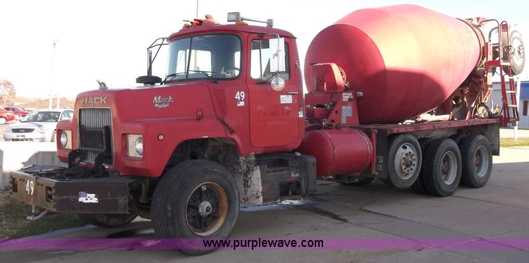 image for item B5072 1987 Mack DM600 triple axle mixer truck