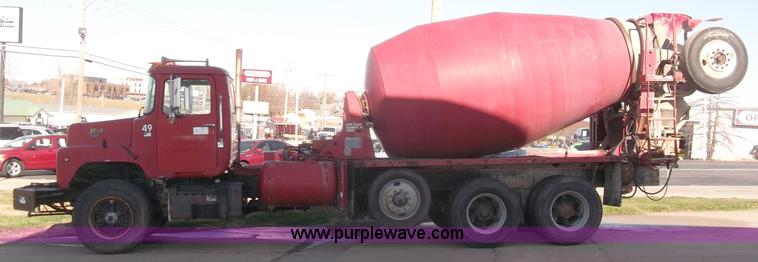 image for item B5072 1987 Mack DM600 triple axle mixer truck
