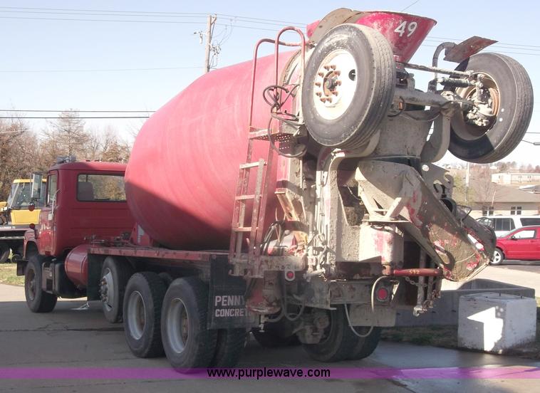 image for item B5072 1987 Mack DM600 triple axle mixer truck
