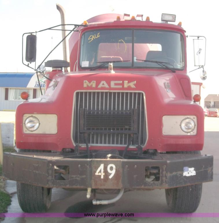 image for item B5072 1987 Mack DM600 triple axle mixer truck