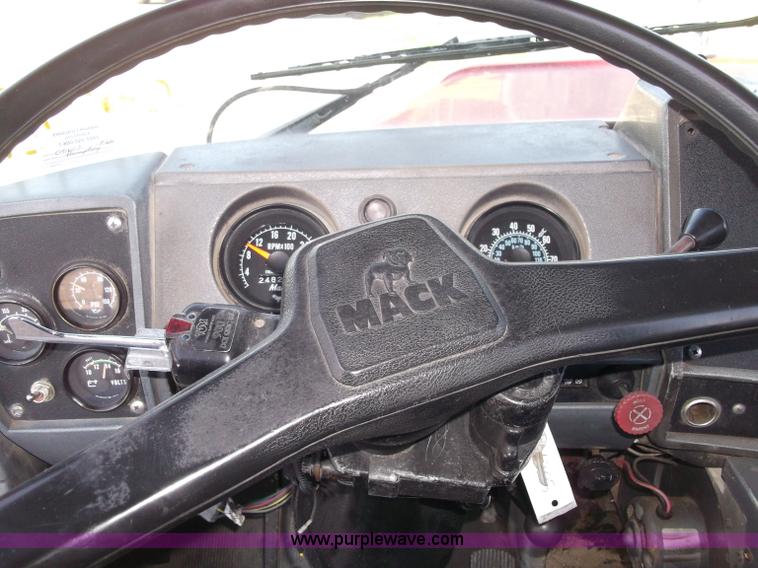 image for item B5072 1987 Mack DM600 triple axle mixer truck