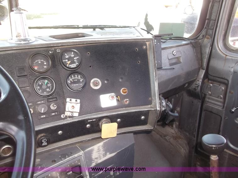 image for item B5072 1987 Mack DM600 triple axle mixer truck