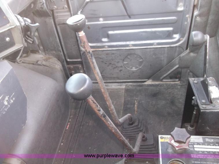 image for item B5072 1987 Mack DM600 triple axle mixer truck