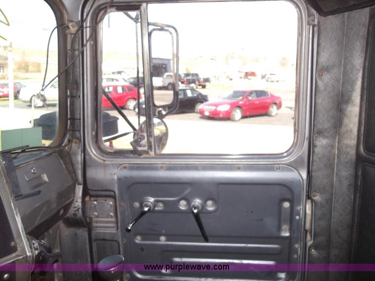 image for item B5072 1987 Mack DM600 triple axle mixer truck