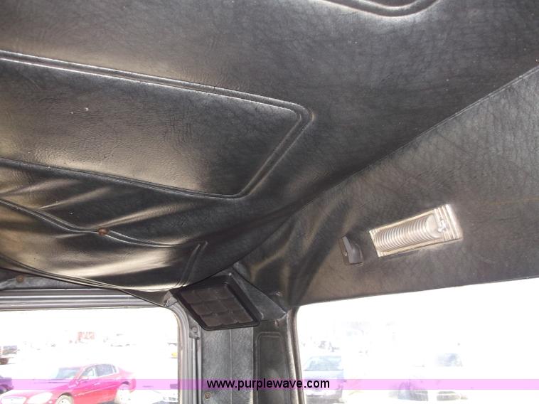 image for item B5072 1987 Mack DM600 triple axle mixer truck