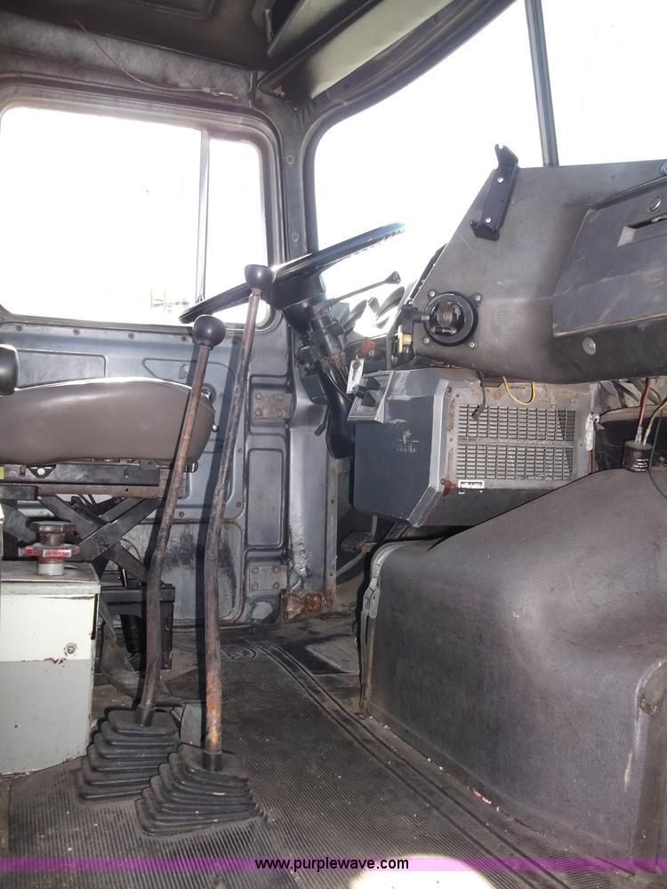 image for item B5072 1987 Mack DM600 triple axle mixer truck