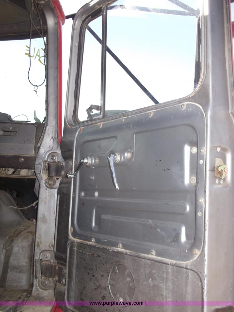 image for item B5072 1987 Mack DM600 triple axle mixer truck