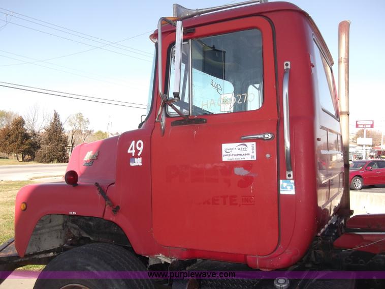 image for item B5072 1987 Mack DM600 triple axle mixer truck