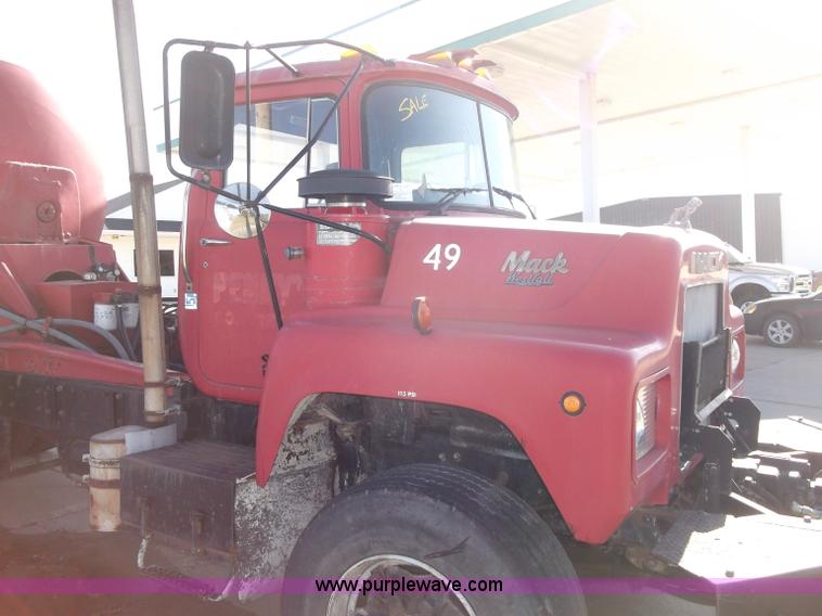 image for item B5072 1987 Mack DM600 triple axle mixer truck