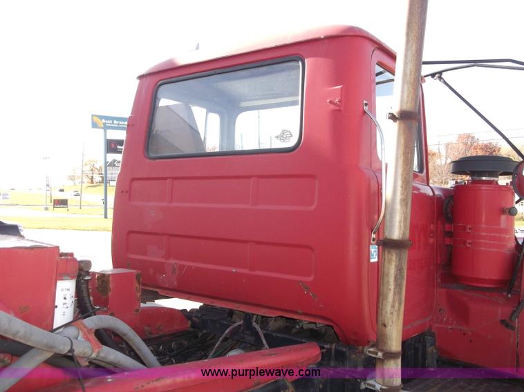 image for item B5072 1987 Mack DM600 triple axle mixer truck