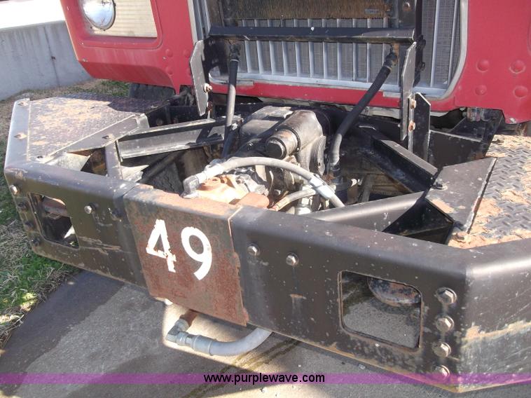 image for item B5072 1987 Mack DM600 triple axle mixer truck