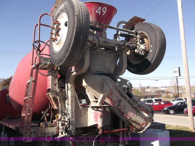 image for item B5072 1987 Mack DM600 triple axle mixer truck