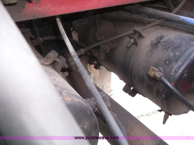 image for item B5072 1987 Mack DM600 triple axle mixer truck