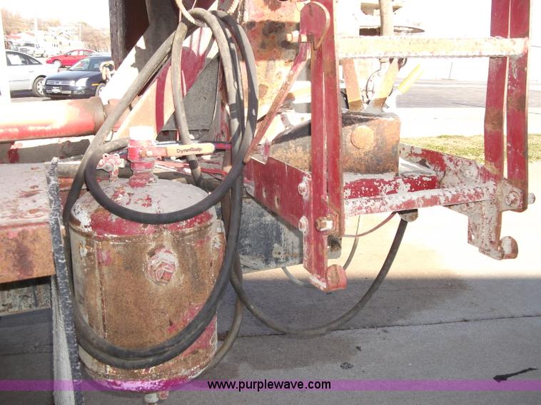 image for item B5072 1987 Mack DM600 triple axle mixer truck