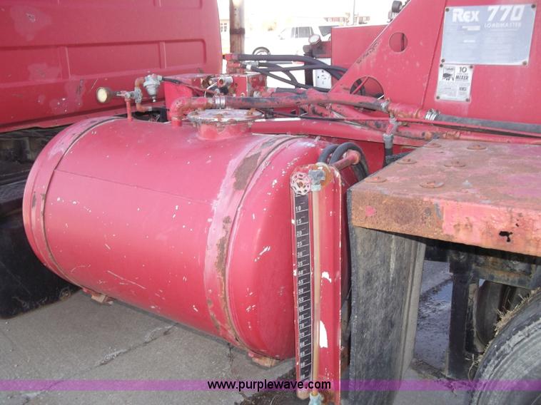 image for item B5072 1987 Mack DM600 triple axle mixer truck