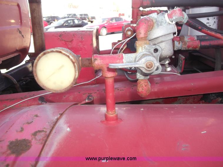 image for item B5072 1987 Mack DM600 triple axle mixer truck