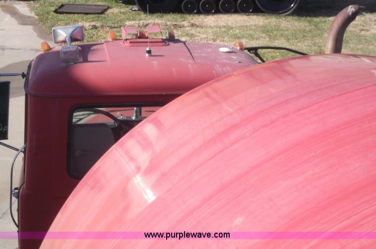 image for item B5072 1987 Mack DM600 triple axle mixer truck