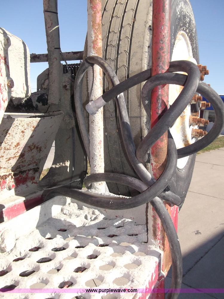 image for item B5072 1987 Mack DM600 triple axle mixer truck