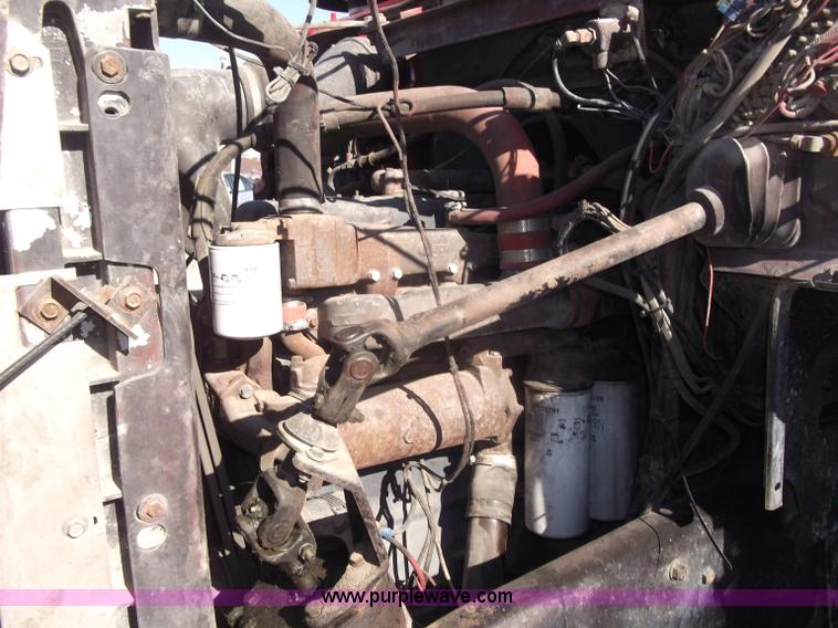 image for item B5072 1987 Mack DM600 triple axle mixer truck