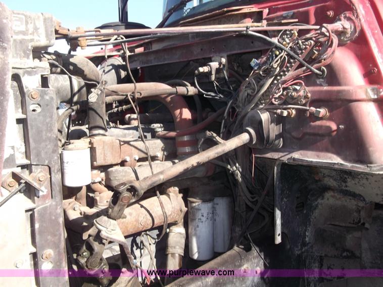 image for item B5072 1987 Mack DM600 triple axle mixer truck