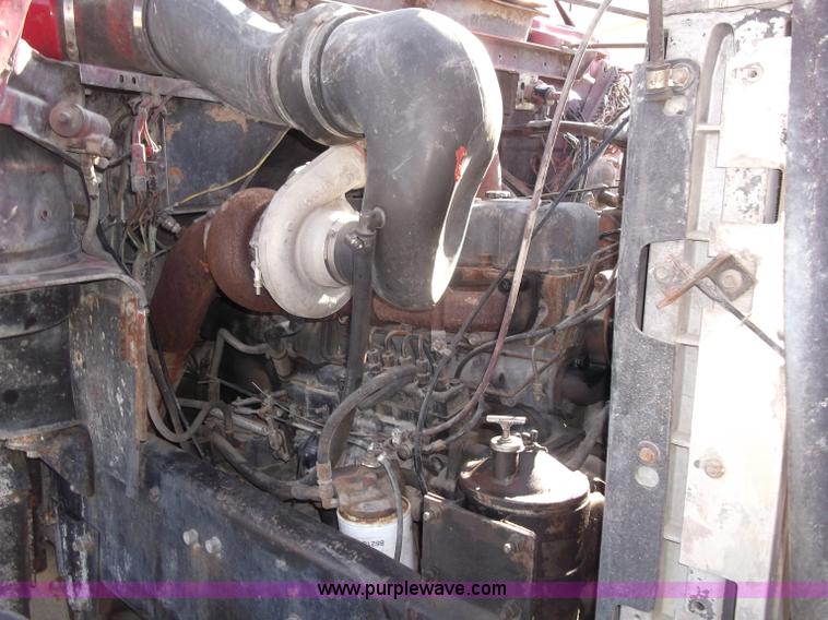image for item B5072 1987 Mack DM600 triple axle mixer truck