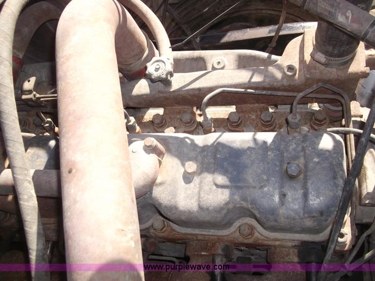 image for item B5072 1987 Mack DM600 triple axle mixer truck