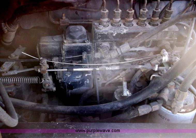 image for item B5072 1987 Mack DM600 triple axle mixer truck