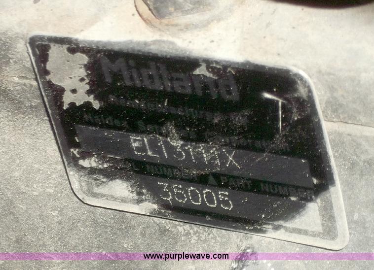 image for item B5072 1987 Mack DM600 triple axle mixer truck