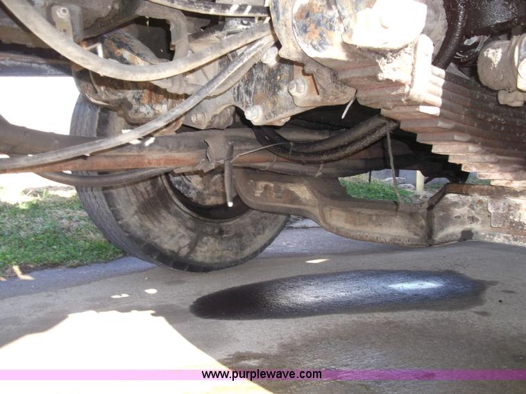 image for item B5072 1987 Mack DM600 triple axle mixer truck