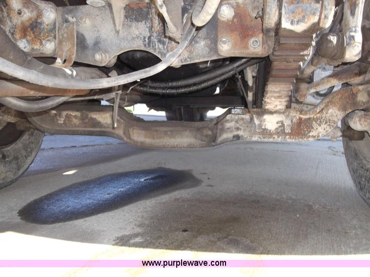 image for item B5072 1987 Mack DM600 triple axle mixer truck