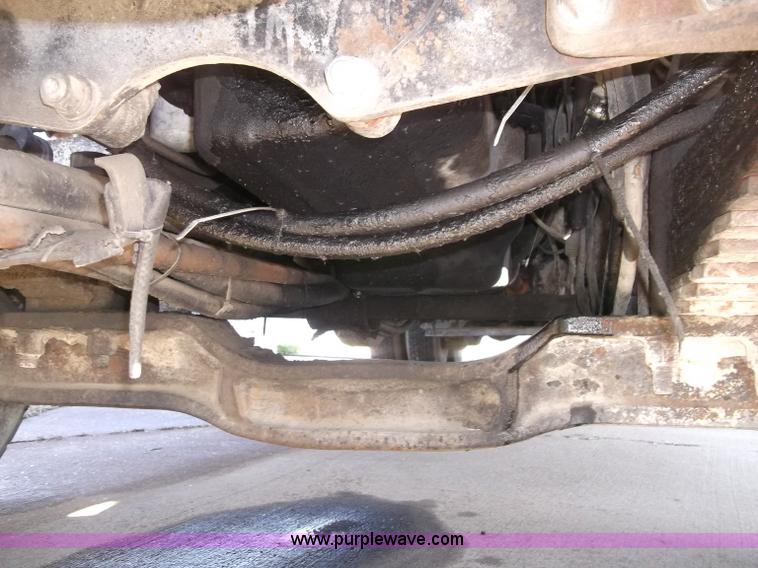 image for item B5072 1987 Mack DM600 triple axle mixer truck