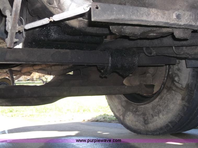 image for item B5072 1987 Mack DM600 triple axle mixer truck