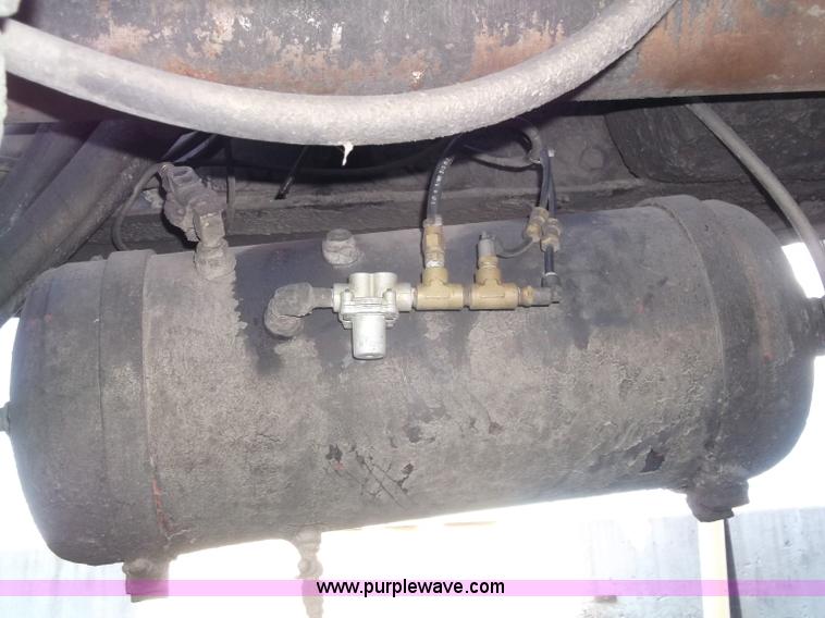 image for item B5072 1987 Mack DM600 triple axle mixer truck