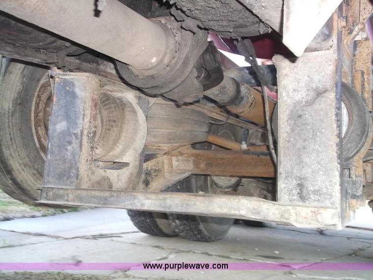 image for item B5072 1987 Mack DM600 triple axle mixer truck