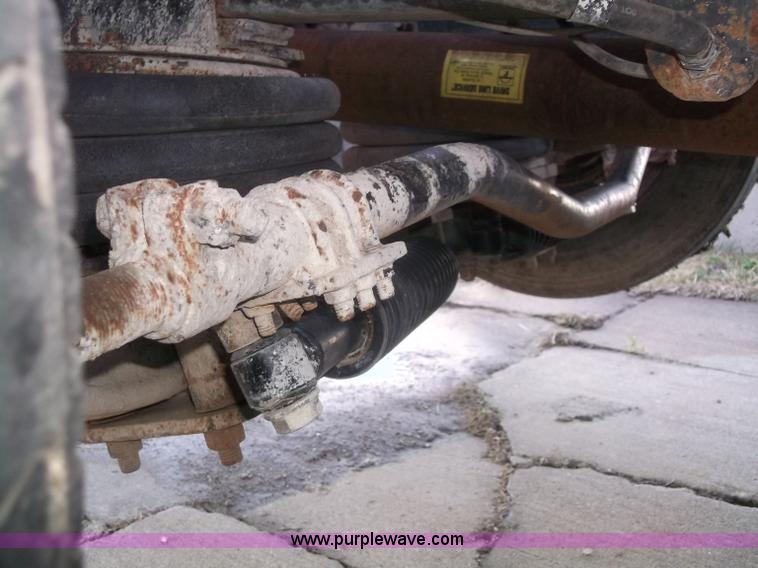 image for item B5072 1987 Mack DM600 triple axle mixer truck